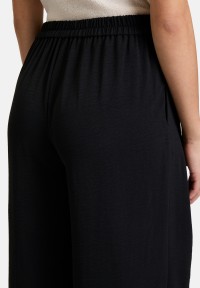 Cartoon Palazzo-Hose mit weitem Bein