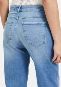 Cartoon Stretch-Jeans mit Eingrifftaschen